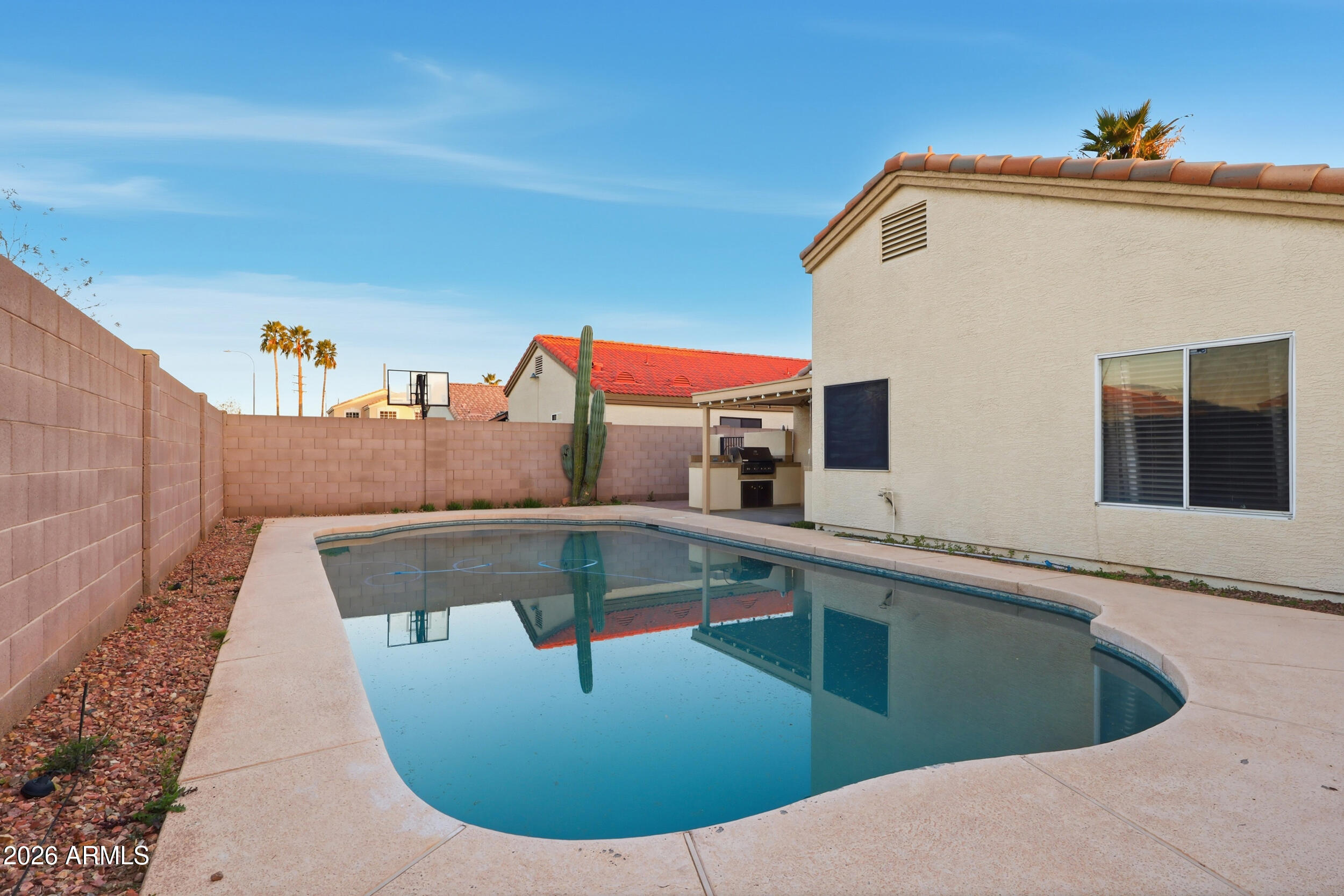 11964 West Granada Road Avondale, AZ 85392 - Photo 31 of 36 a view of outdoor space with swimming pool