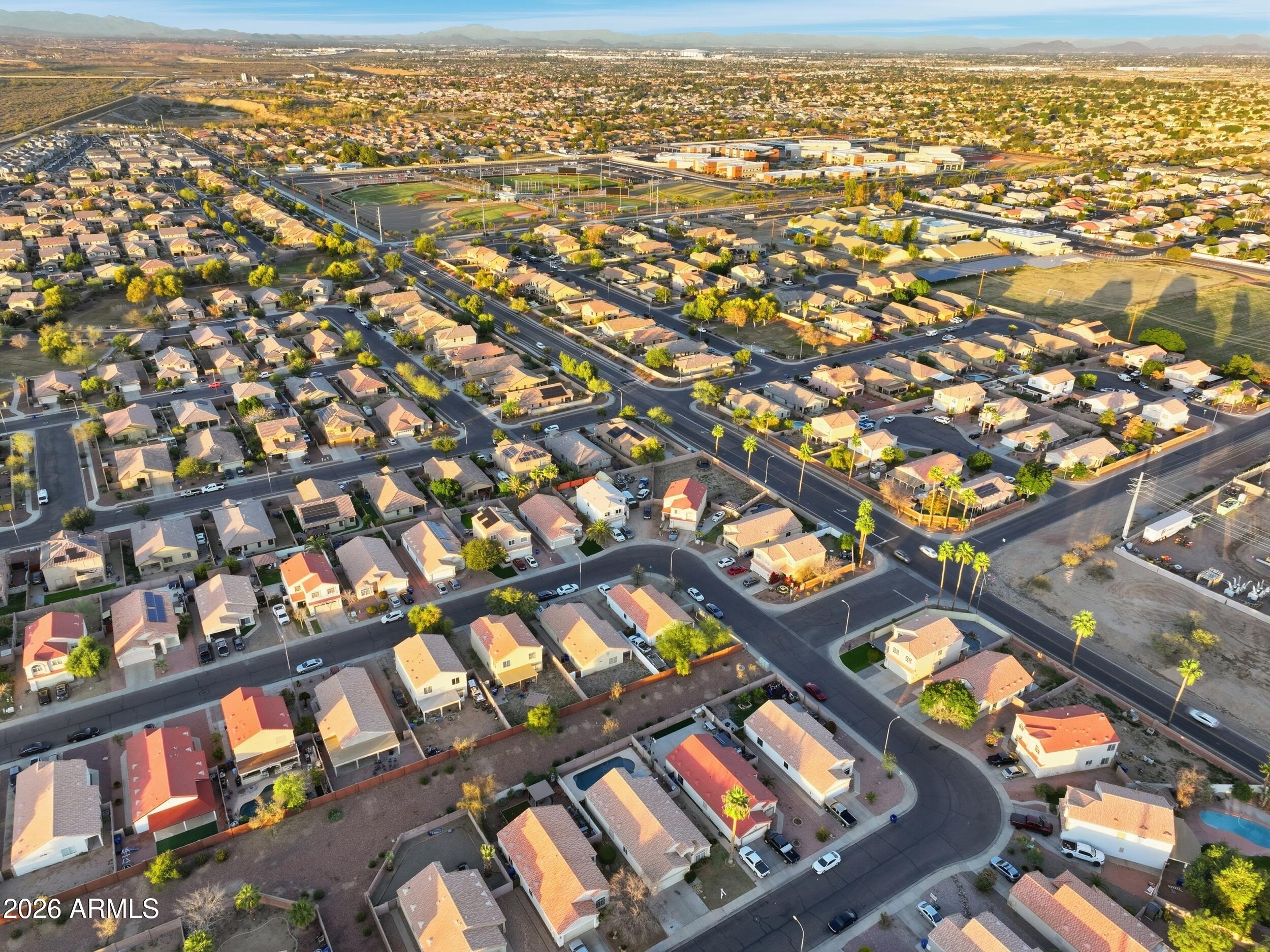 11964 West Granada Road Avondale, AZ 85392 - Photo 36 of 36 an aerial view of residential houses with outdoor space
