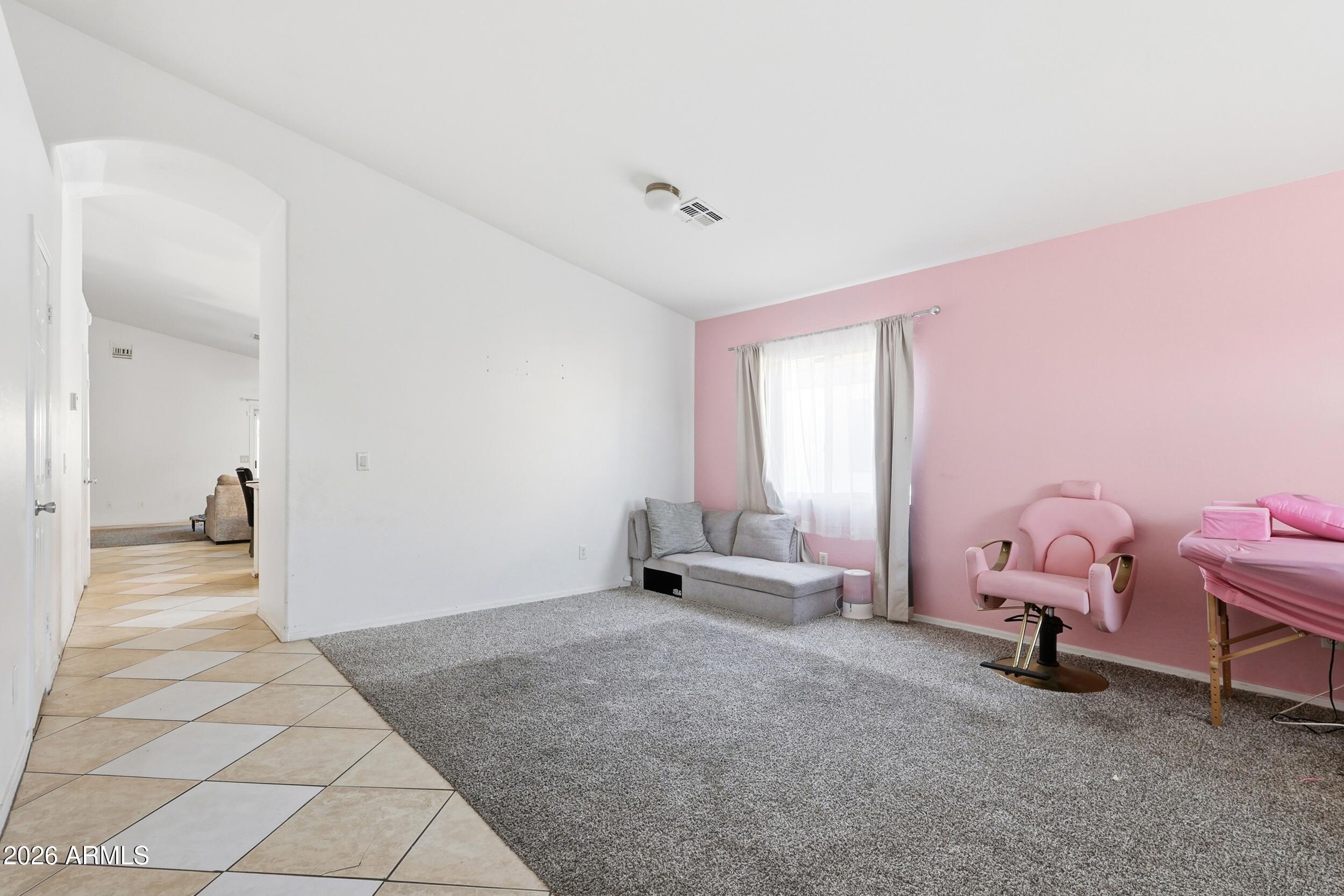 11964 West Granada Road Avondale, AZ 85392 - Photo 5 of 36 a view of a room with toys