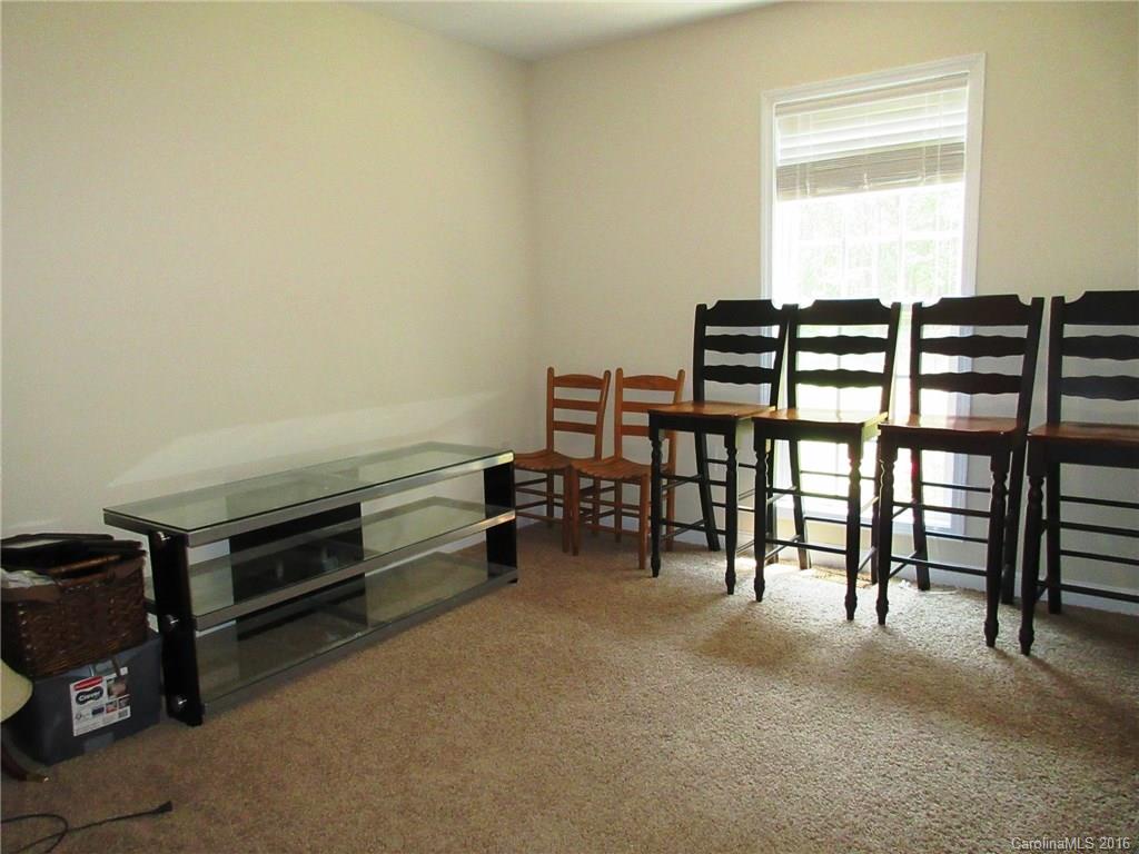 632 Hall Spencer Road Catawba, SC 29704 - Photo 12 of 17 a view of a livingroom with furniture and white cabinets