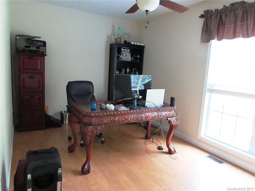 632 Hall Spencer Road Catawba, SC 29704 - Photo 13 of 17 a room with a desk and chairs