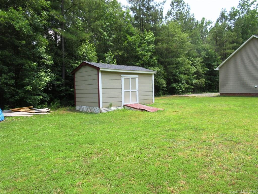 632 Hall Spencer Road Catawba, SC 29704 - Photo 16 of 17 a backyard of a house with lots of green space