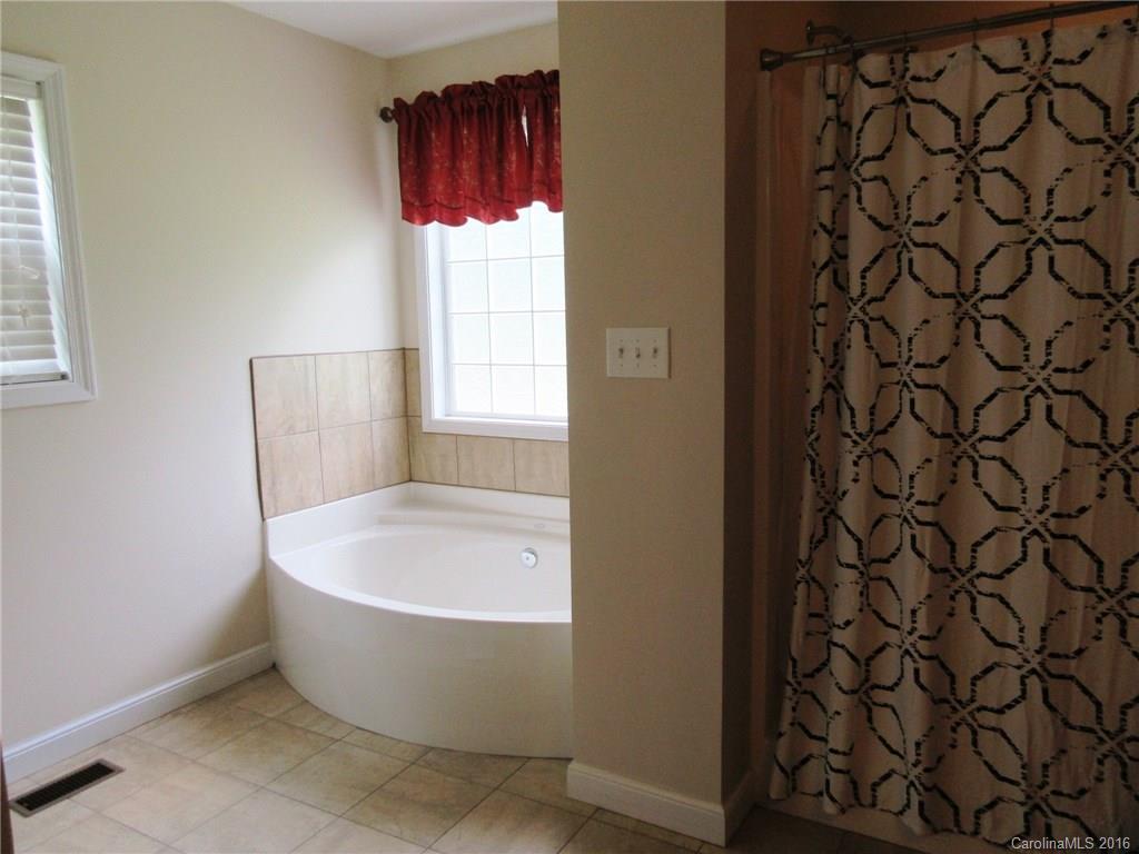 632 Hall Spencer Road Catawba, SC 29704 - Photo 8 of 17 a view of a bathtub in a bathroom