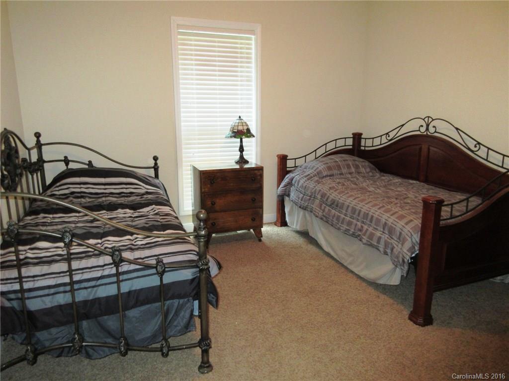 632 Hall Spencer Road Catawba, SC 29704 - Photo 10 of 17 a bedroom with a bed and a table