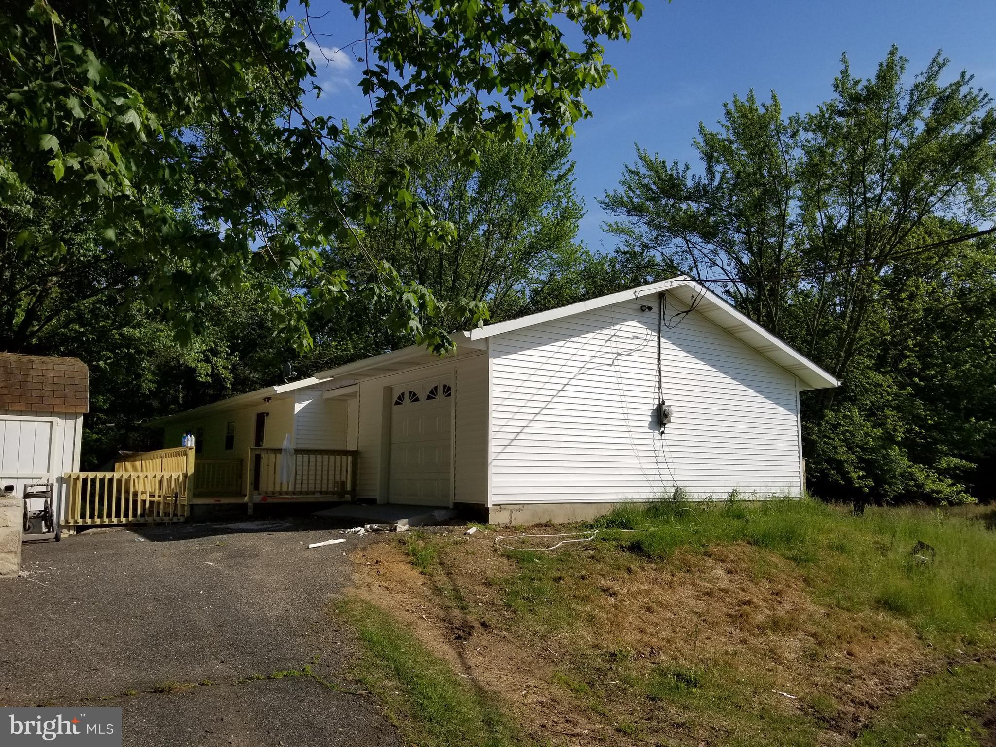 244 South Game Creek Road Penns Grove, NJ 08069 - Photo 4 of 9 a house with a yard