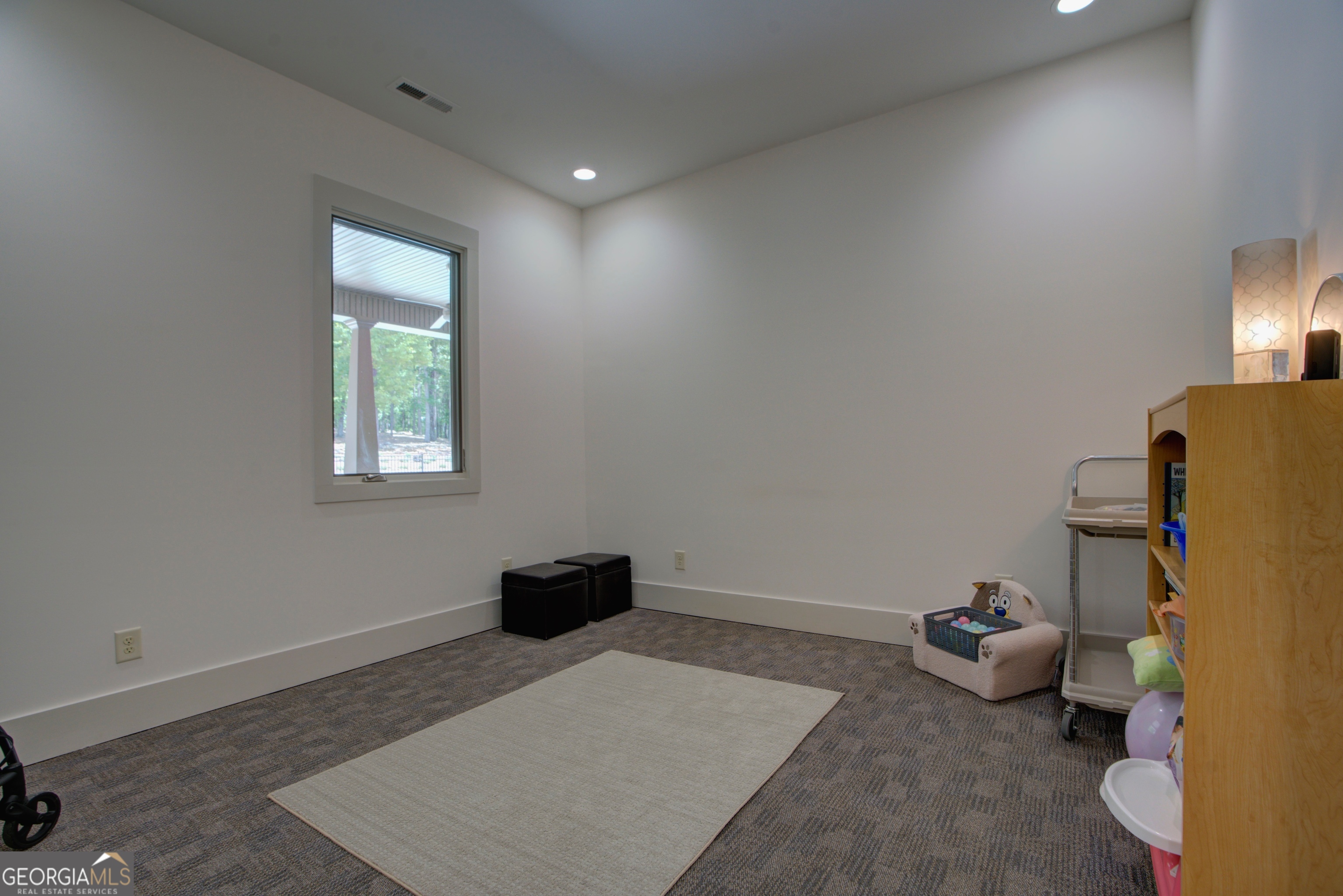 610 Kings Bridge Road Cave Spring, GA 30124 - Photo 27 of 72 a living room with furniture and a window