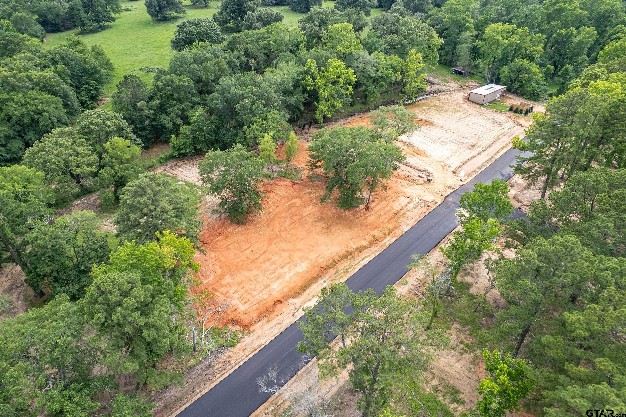 12141 Stephanie Lane Flint, TX 75762 - Photo 5 of 24 an aerial view of residential houses with outdoor space