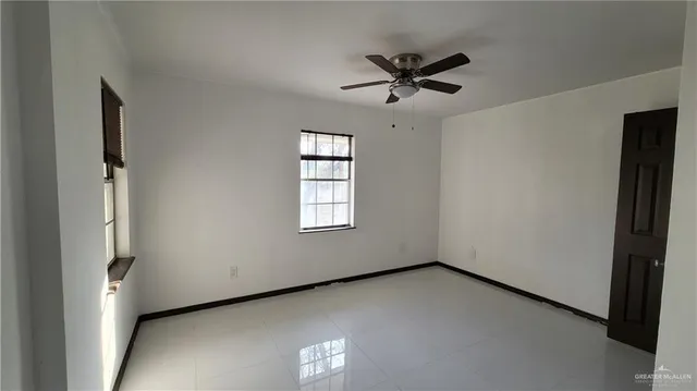 a view of a utility room with closet