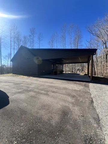 a house with trees in the background