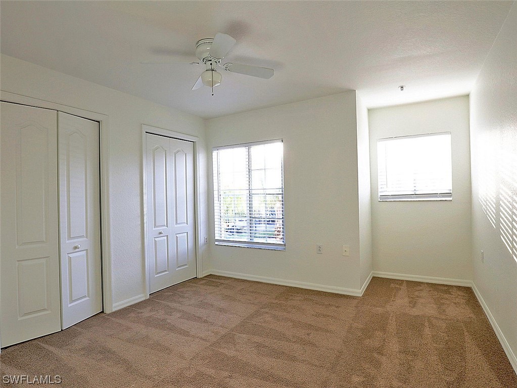9419 Ivy Brook Run, Unit 1204 Fort Myers, FL 33913 - Photo 11 of 22 a view of an empty room with a window