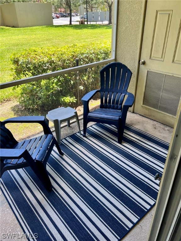9419 Ivy Brook Run, Unit 1204 Fort Myers, FL 33913 - Photo 15 of 22 a view of a chairs and table on the roof deck