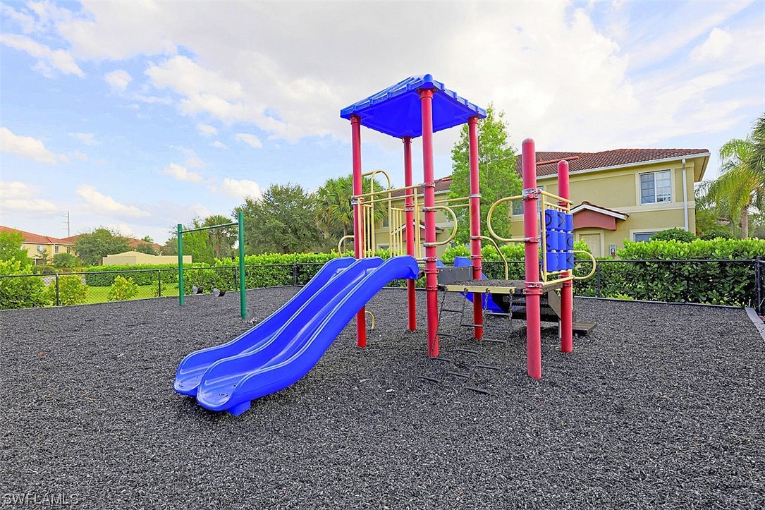 9419 Ivy Brook Run, Unit 1204 Fort Myers, FL 33913 - Photo 22 of 22 a view of a park with slide