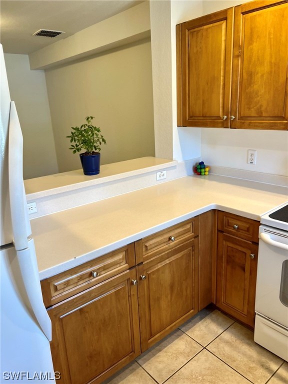 9419 Ivy Brook Run, Unit 1204 Fort Myers, FL 33913 - Photo 5 of 22 a kitchen with a sink and cabinets