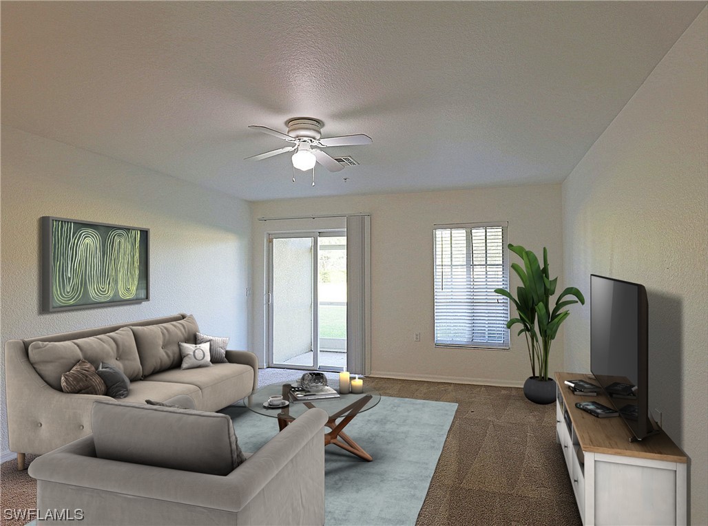 9419 Ivy Brook Run, Unit 1204 Fort Myers, FL 33913 - Photo 8 of 22 a living room with furniture potted plant and window