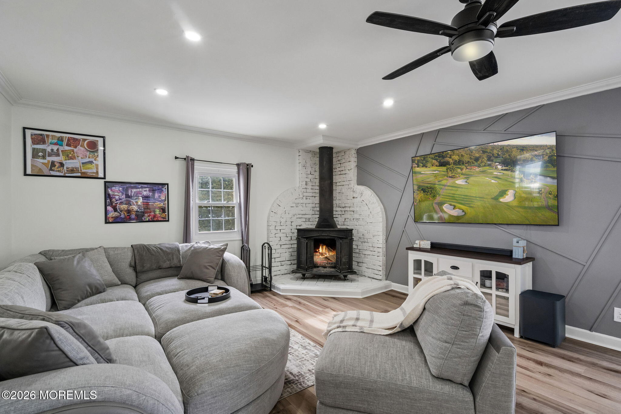 121 Corson Avenue Hamilton, NJ 08619 - Photo 11 of 32 a living room with furniture and a flat screen tv