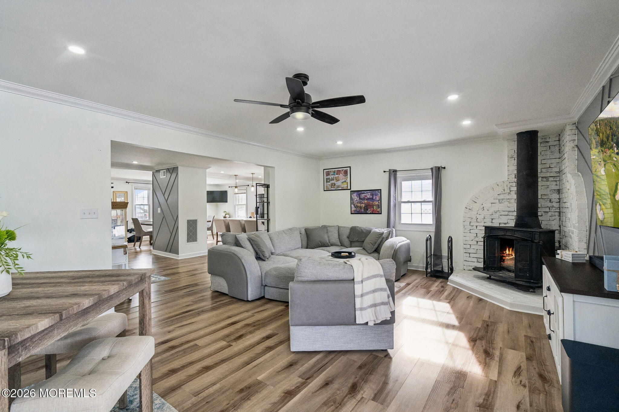 121 Corson Avenue Hamilton, NJ 08619 - Photo 12 of 32 a living room with furniture fireplace and a window