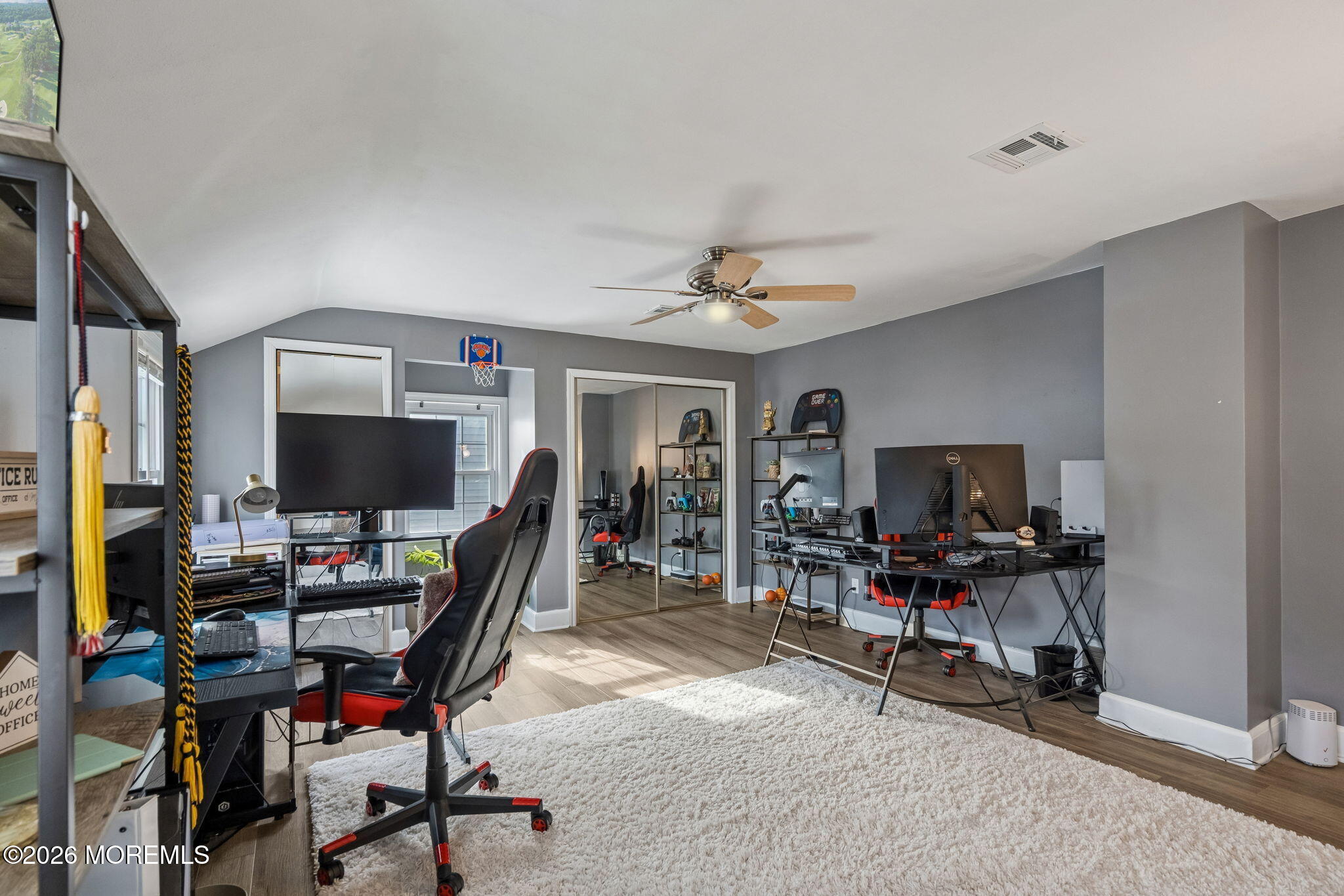121 Corson Avenue Hamilton, NJ 08619 - Photo 17 of 32 a view of a workspace with furniture and a bedroom