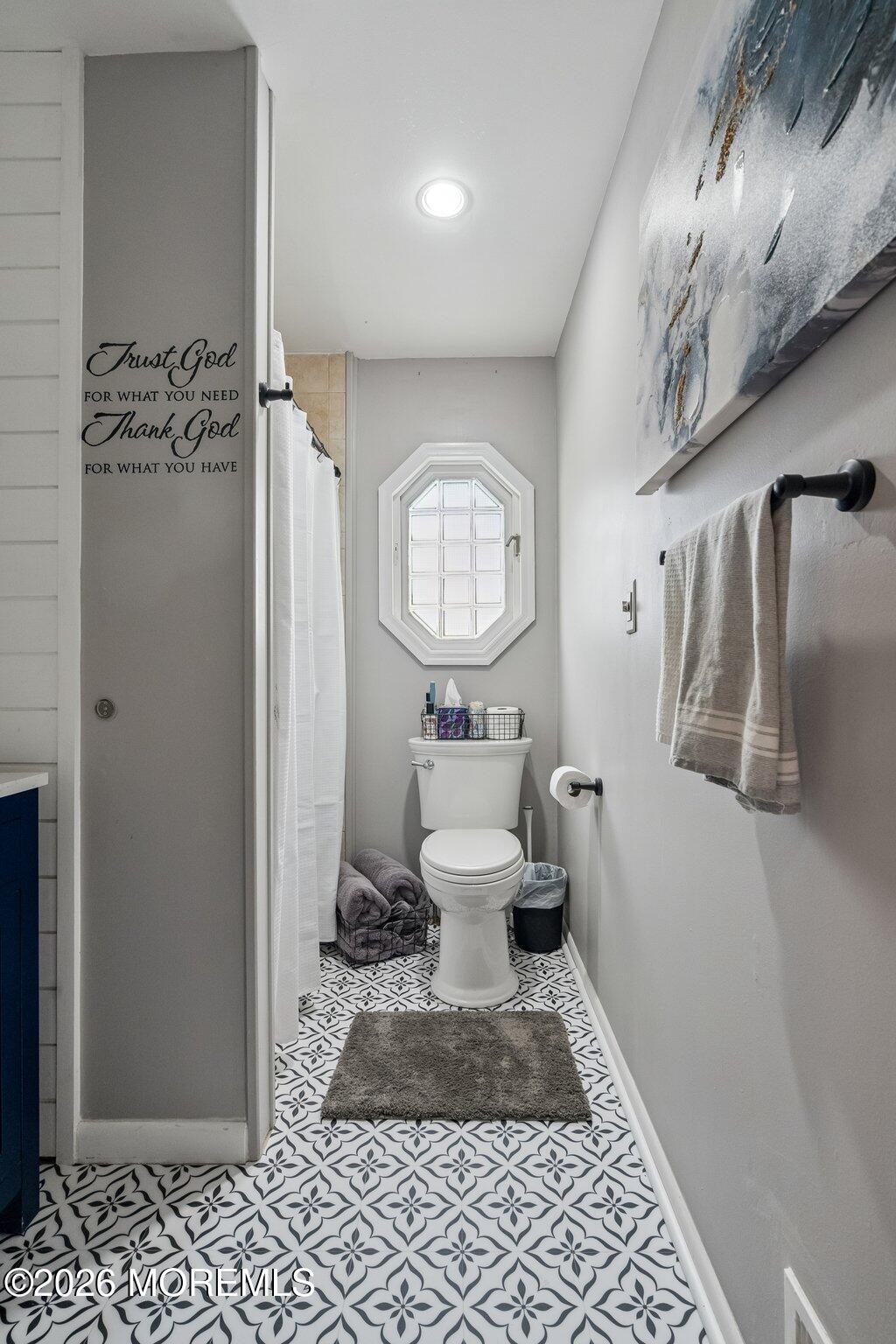 121 Corson Avenue Hamilton, NJ 08619 - Photo 25 of 32 a bathroom with a toilet and a shower