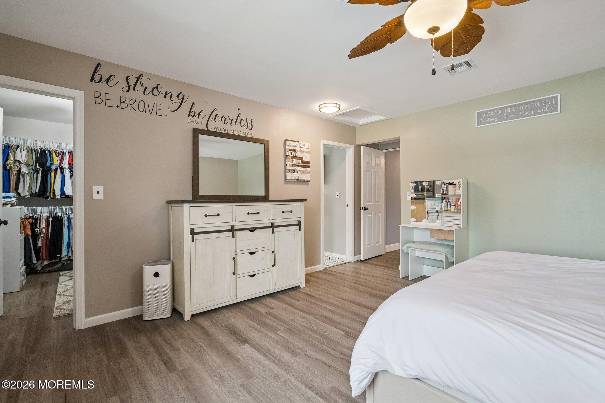 121 Corson Avenue Hamilton, NJ 08619 - Photo 26 of 32 a bedroom with a bed and a cabinets