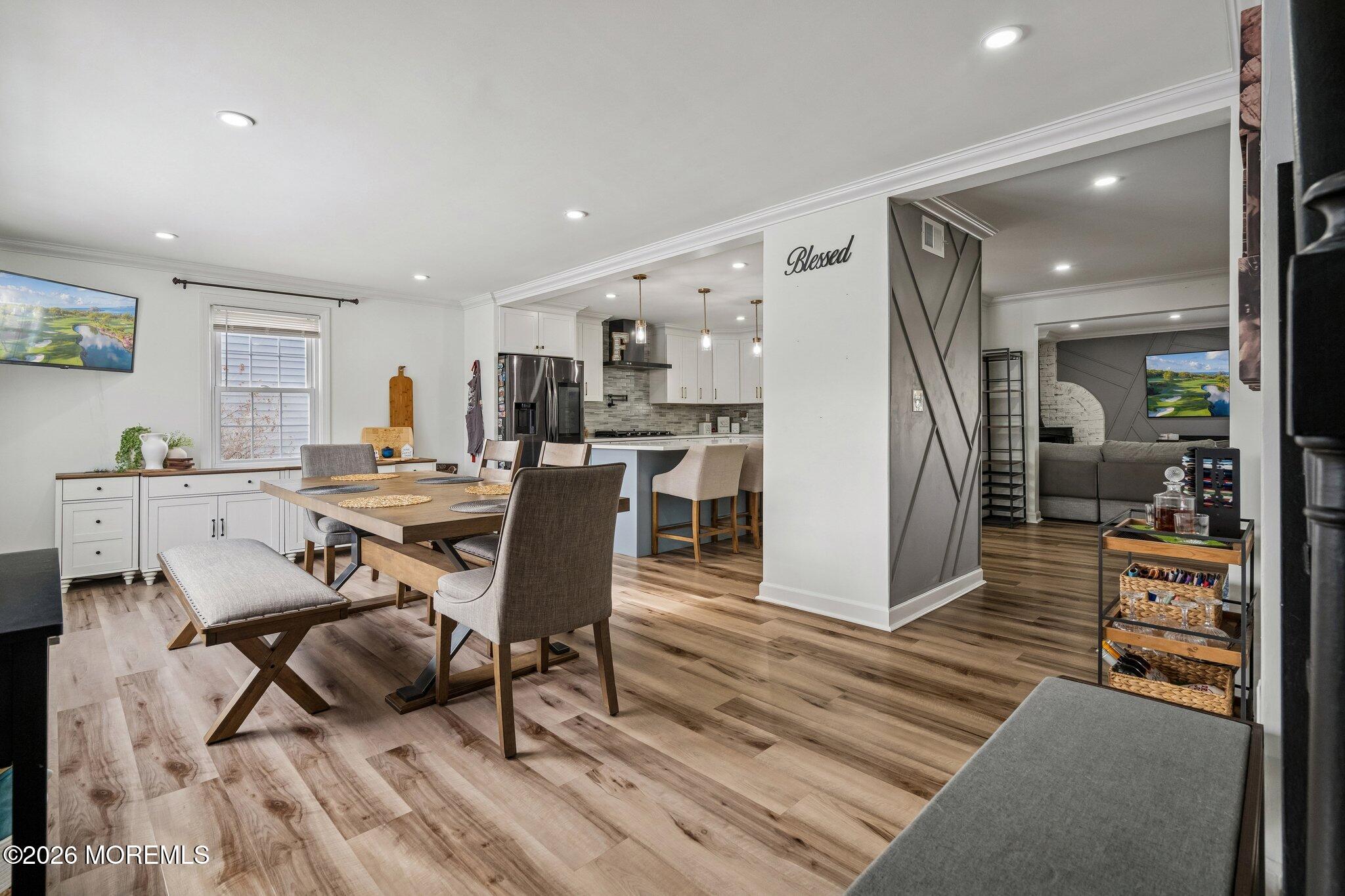 121 Corson Avenue Hamilton, NJ 08619 - Photo 3 of 32 a view of a dining room with furniture and wooden floor