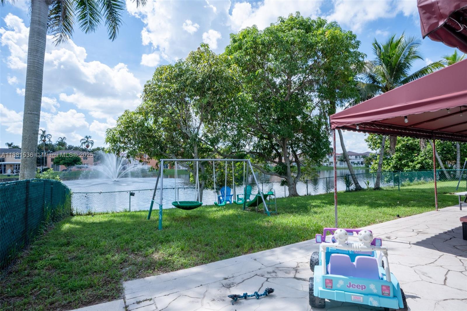 13000 Southwest 52nd Street Miramar, FL 33027 - Photo 13 of 16 a garden view with a seating space