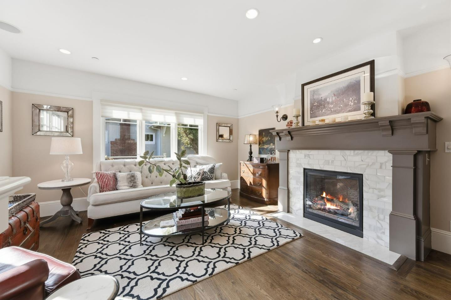 1212 Mills Avenue Burlingame, CA 94010 - Photo 14 of 32 a living room with furniture and a fireplace