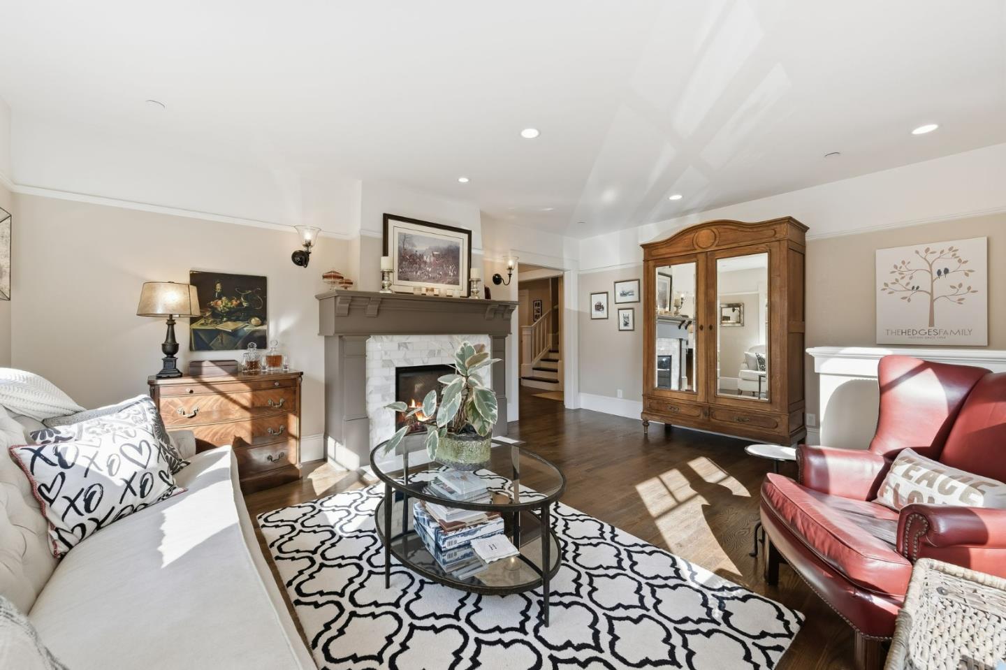 1212 Mills Avenue Burlingame, CA 94010 - Photo 15 of 32 a living room with furniture and a fireplace