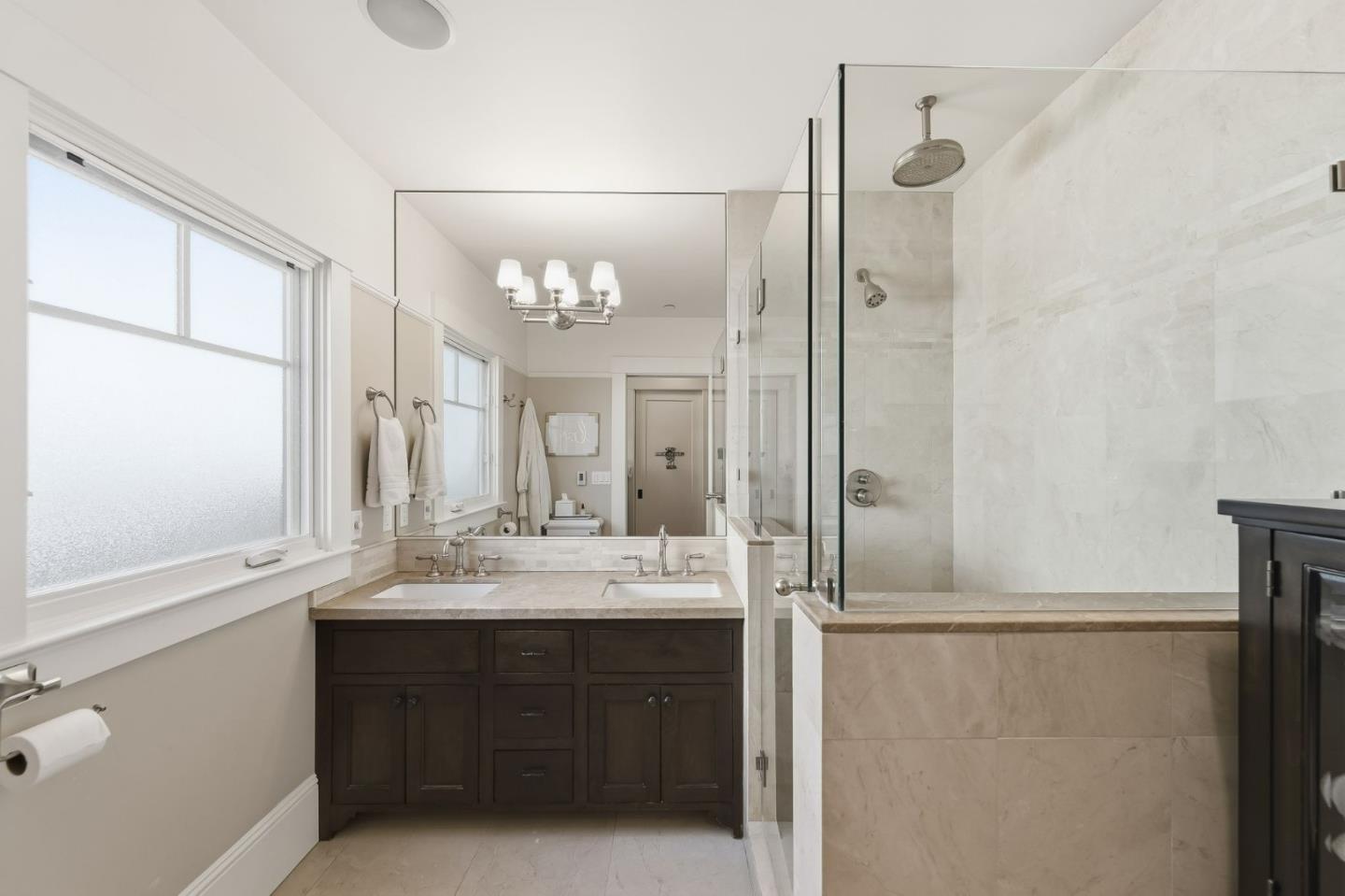 1212 Mills Avenue Burlingame, CA 94010 - Photo 18 of 32 a bathroom with a sink vanity and a mirror