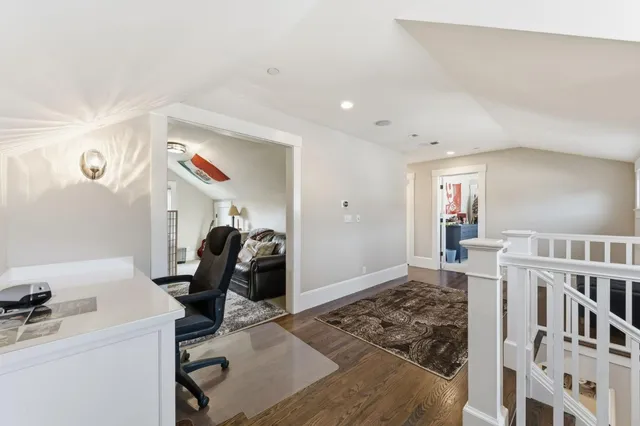 a bedroom with furniture and a window