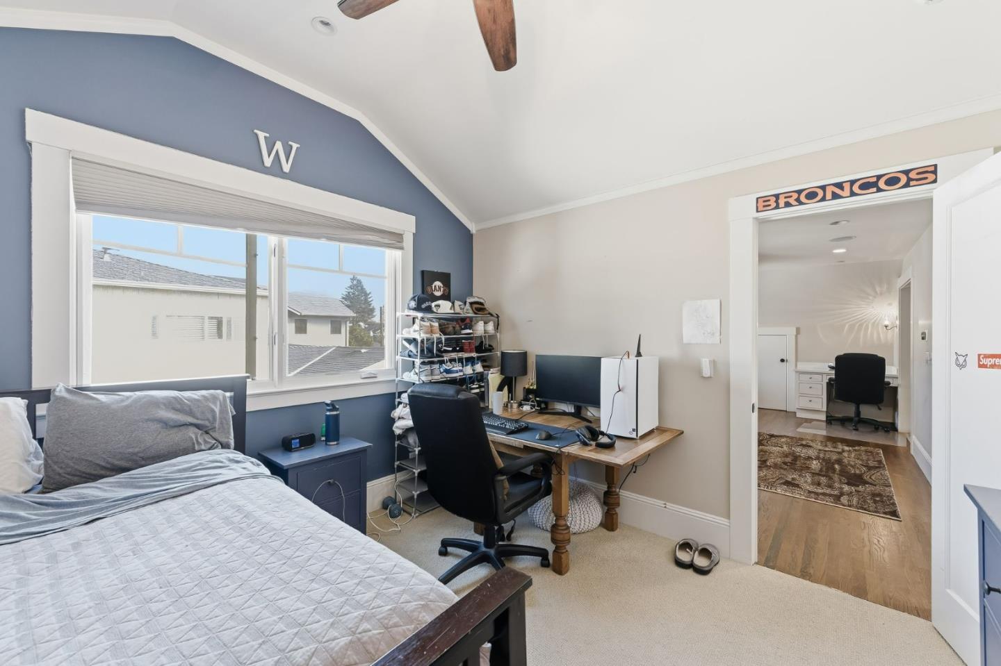 1212 Mills Avenue Burlingame, CA 94010 - Photo 25 of 32 a bedroom with a bed and a desk