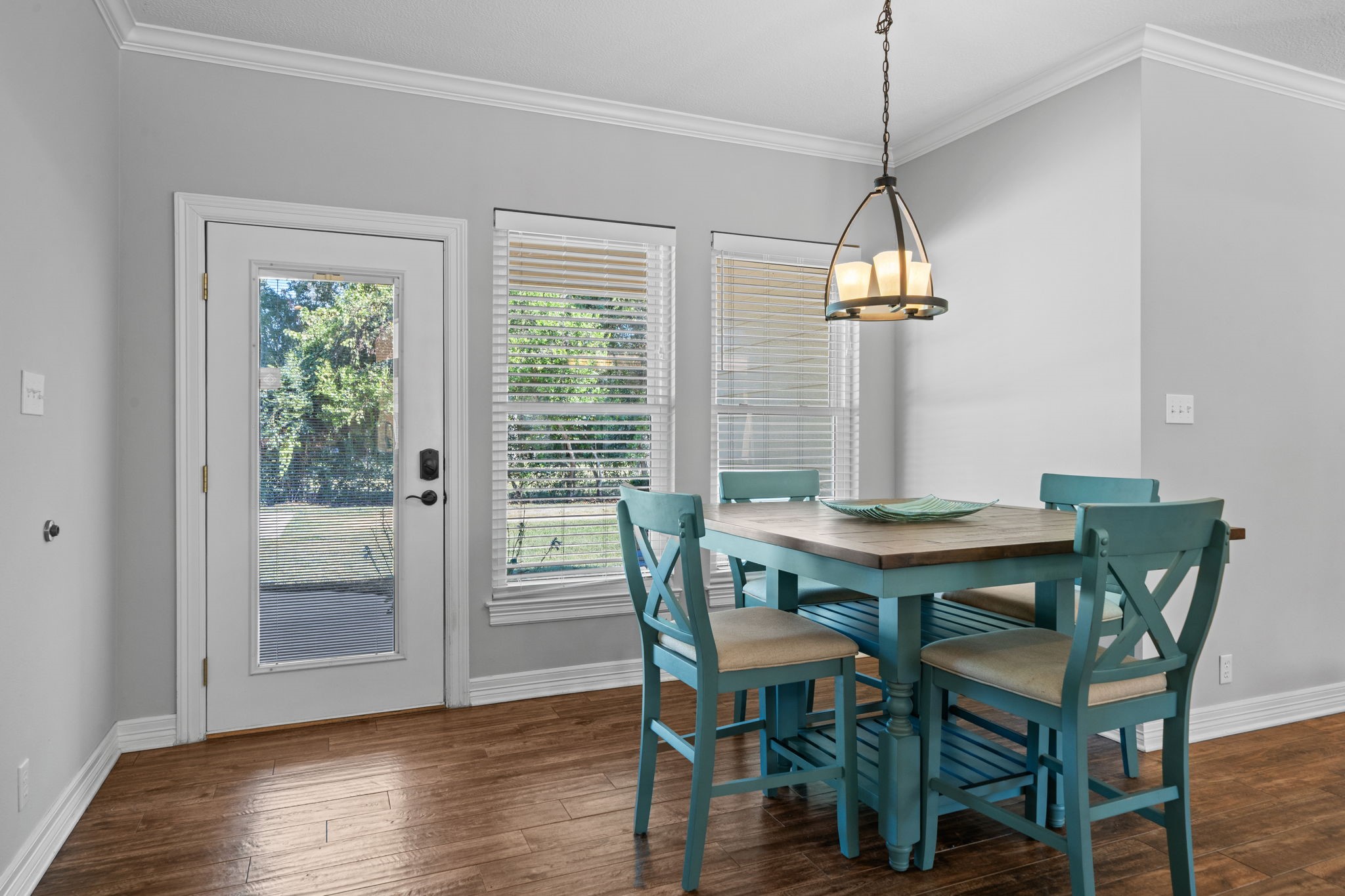 18355 Burkhardt Road Tomball, TX 77377 - Photo 11 of 50 a view of a dining room with furniture window and wooden floor