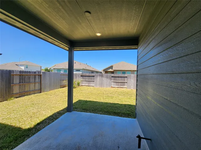 a front view of house with yard and seating area