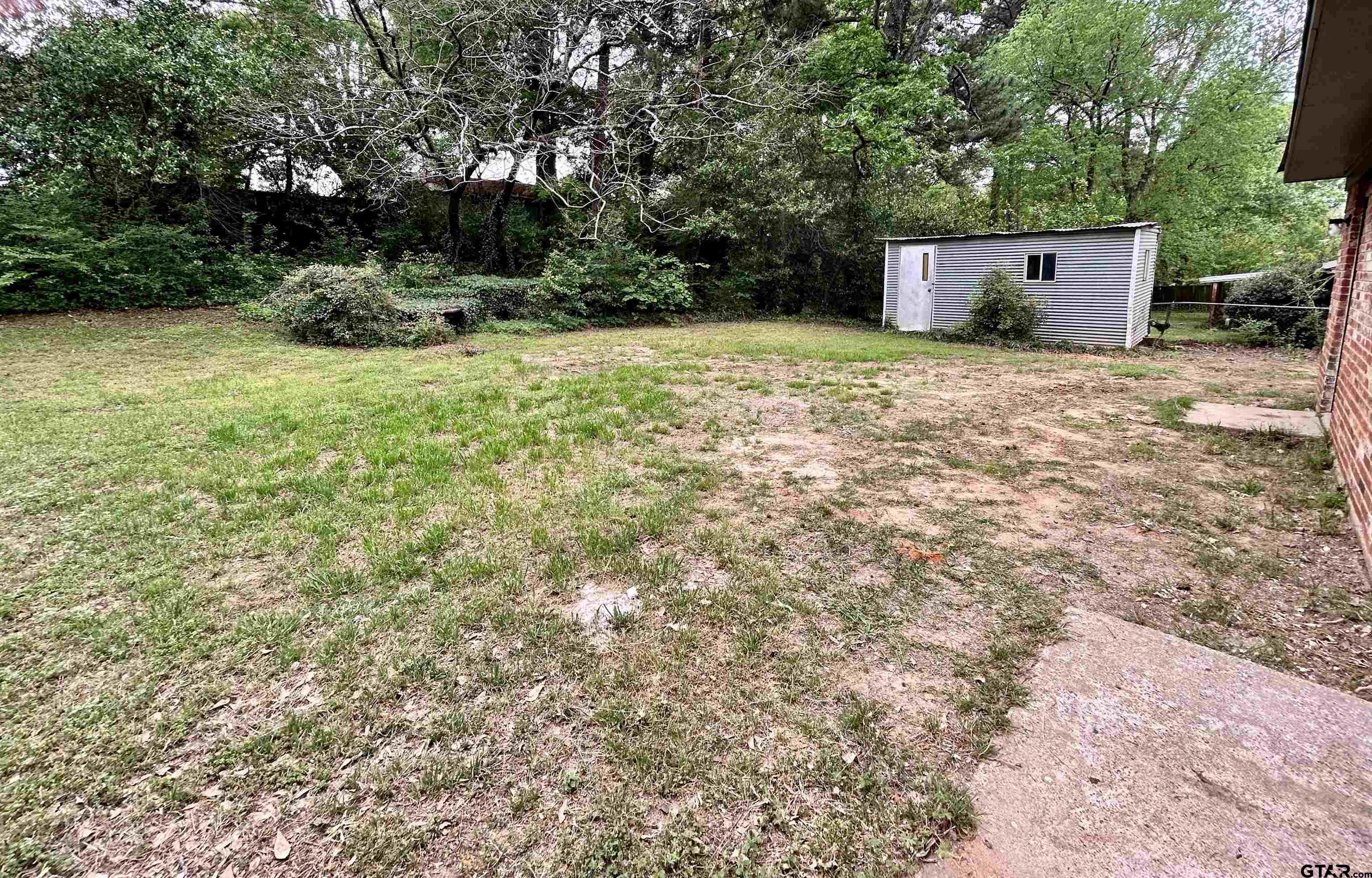 1106 Annette Drive Longview, TX 75604 - Photo 21 of 21 a view of an outdoor space and yard