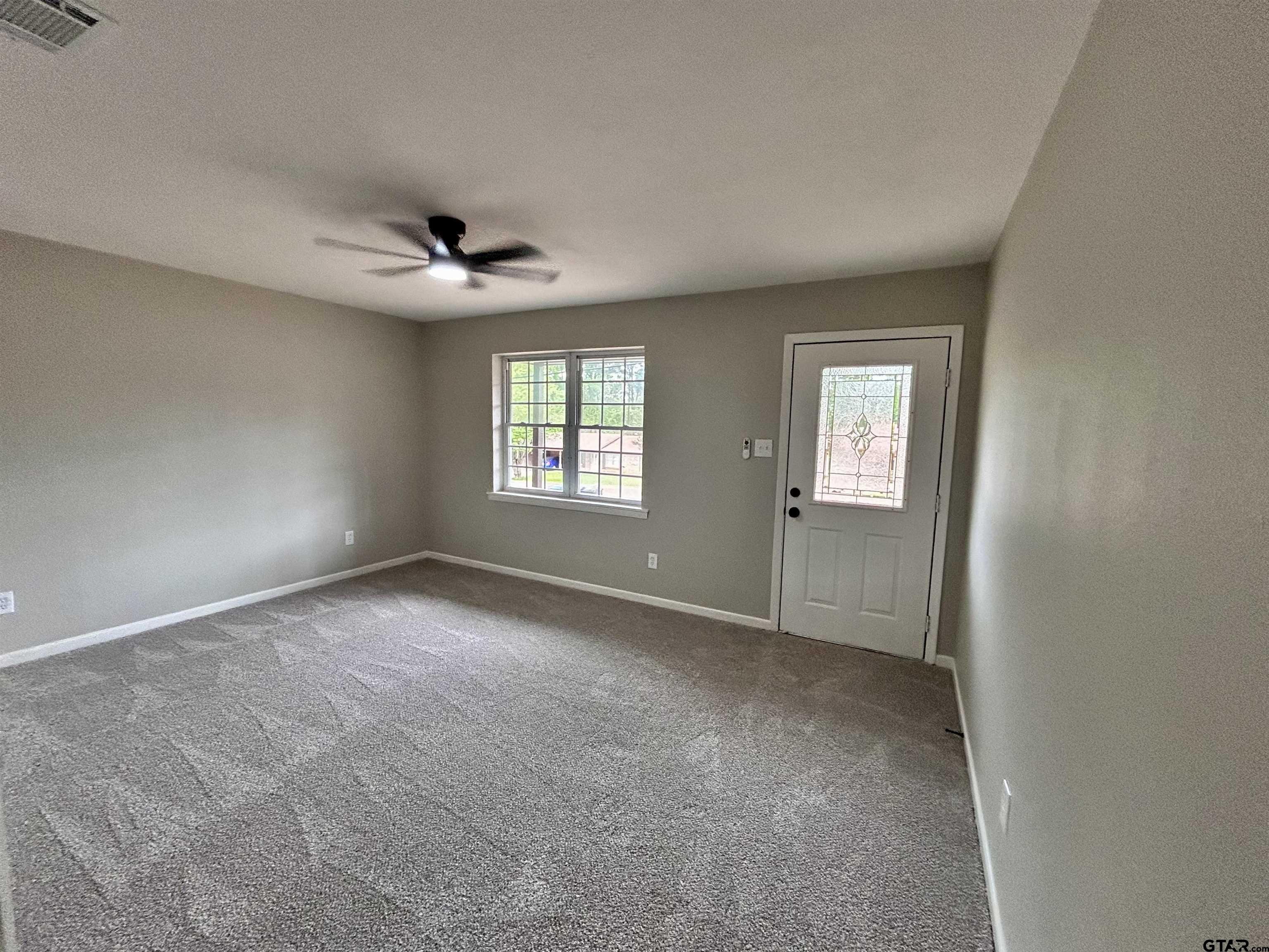 1106 Annette Drive Longview, TX 75604 - Photo 5 of 21 an empty room with windows and closet