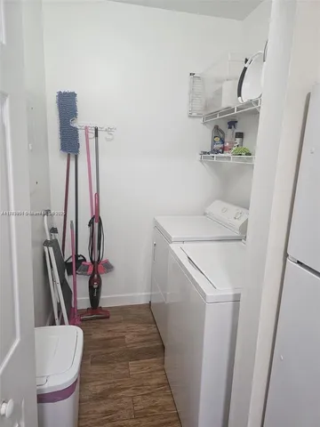 a bathroom with a sink a toilet and a shower