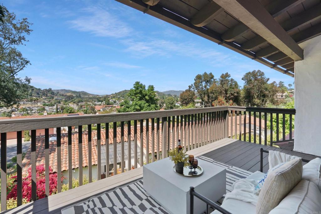 1126 Hermosillo Glen Escondido, CA 92026 - Photo 11 of 32 a view of a chairs and table on the deck