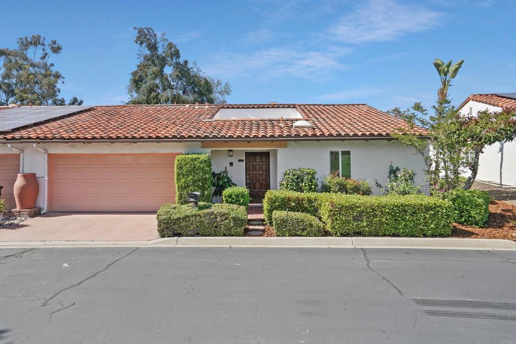 1126 Hermosillo Glen Escondido, CA 92026 - Photo 13 of 32 front view of a house with a yard