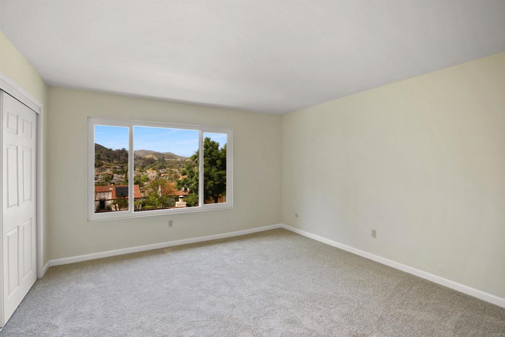 1126 Hermosillo Glen Escondido, CA 92026 - Photo 20 of 32 an empty room with a window