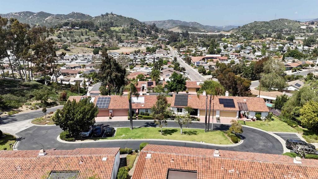 1126 Hermosillo Glen Escondido, CA 92026 - Photo 31 of 32 an aerial view of residential houses with outdoor space and trees