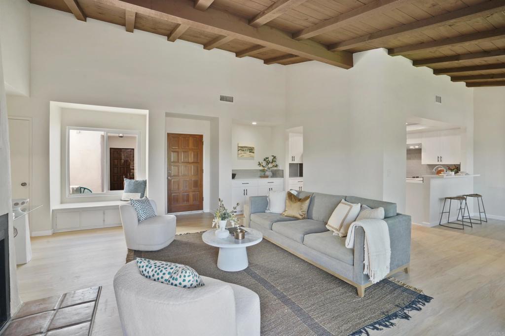 1126 Hermosillo Glen Escondido, CA 92026 - Photo 6 of 32 a living room with furniture and a table