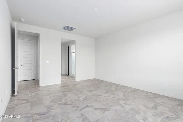 an empty room with a natural light