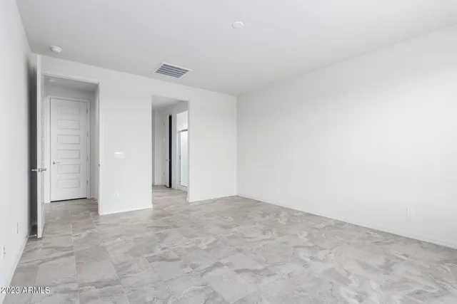 an empty room with a natural light