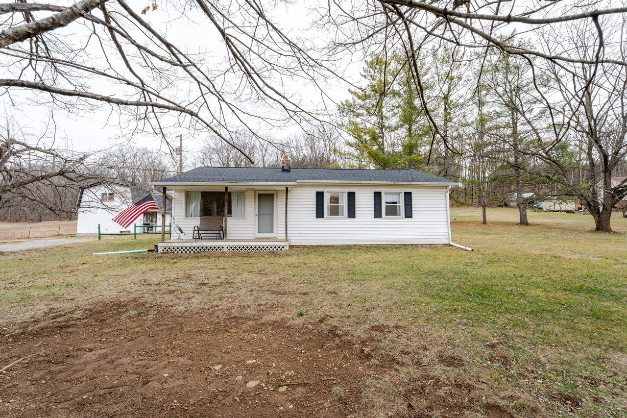 11918 Turleytown Road Broadway, VA 22815 - Photo 31 of 42 a front view of a house with a yard and trees