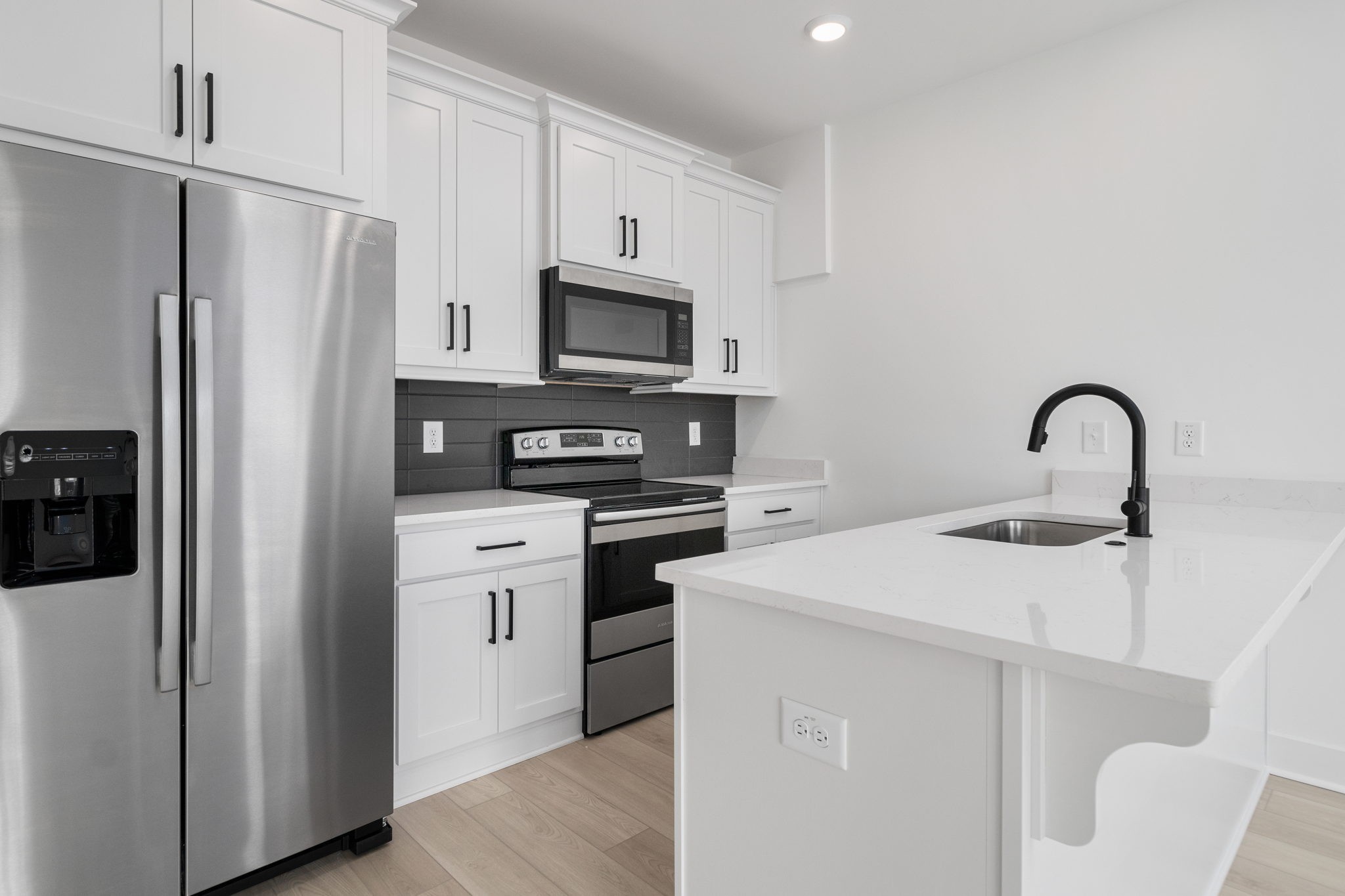 725 Hornbuckle Road, Unit O3 Clarksville, TN 37043 - Photo 3 of 38 a kitchen with a refrigerator sink and microwave