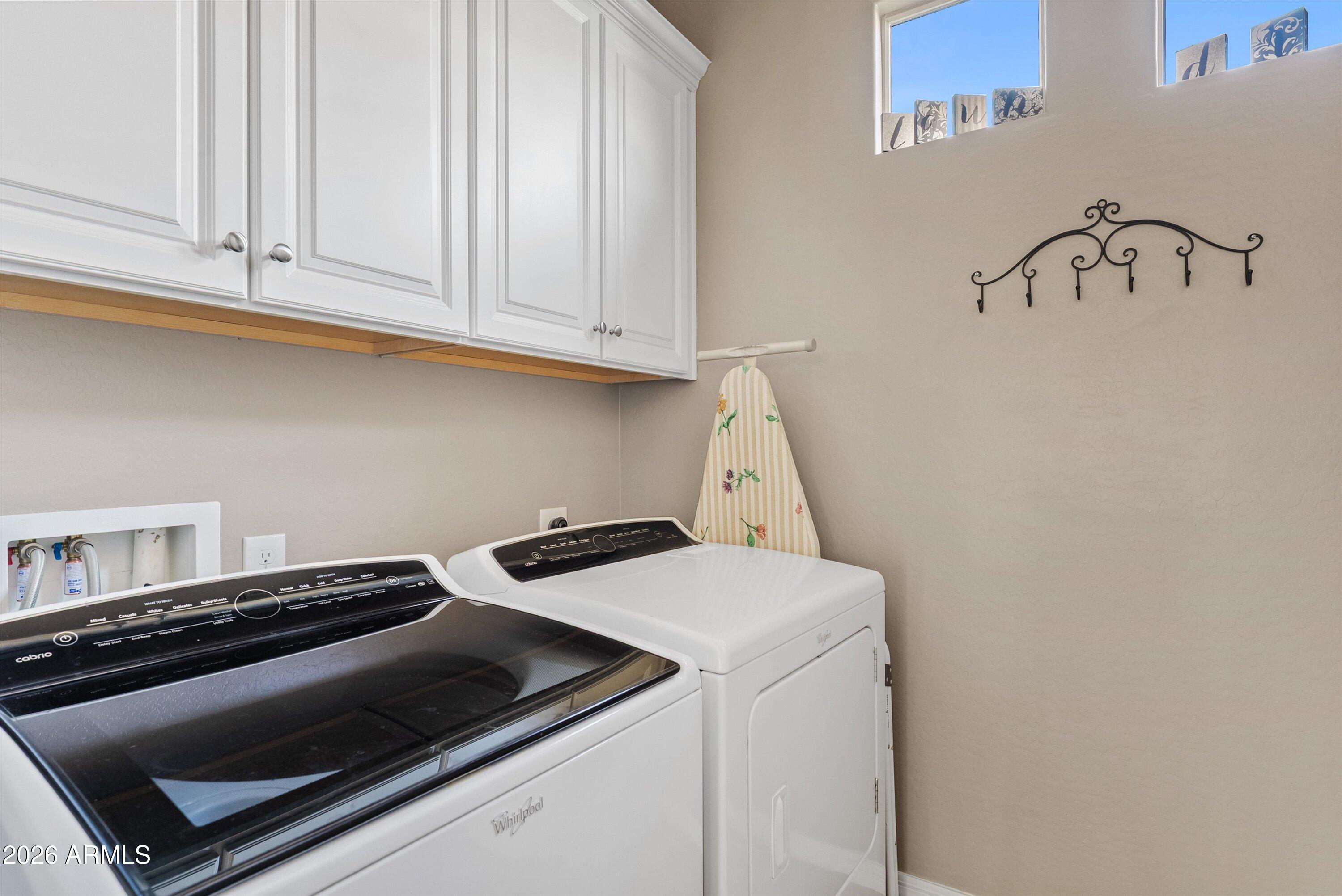 4461 East Jones Street Gilbert, AZ 85295 - Photo 17 of 40 a utility room with dryer and washer