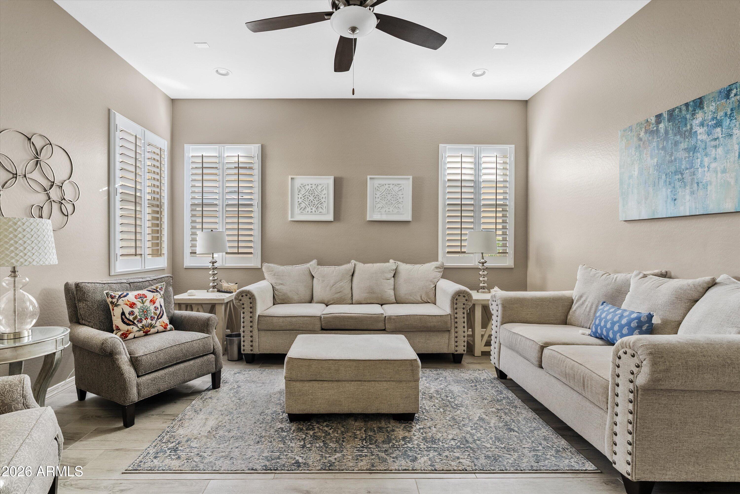 4461 East Jones Street Gilbert, AZ 85295 - Photo 19 of 40 a living room with furniture and a large window