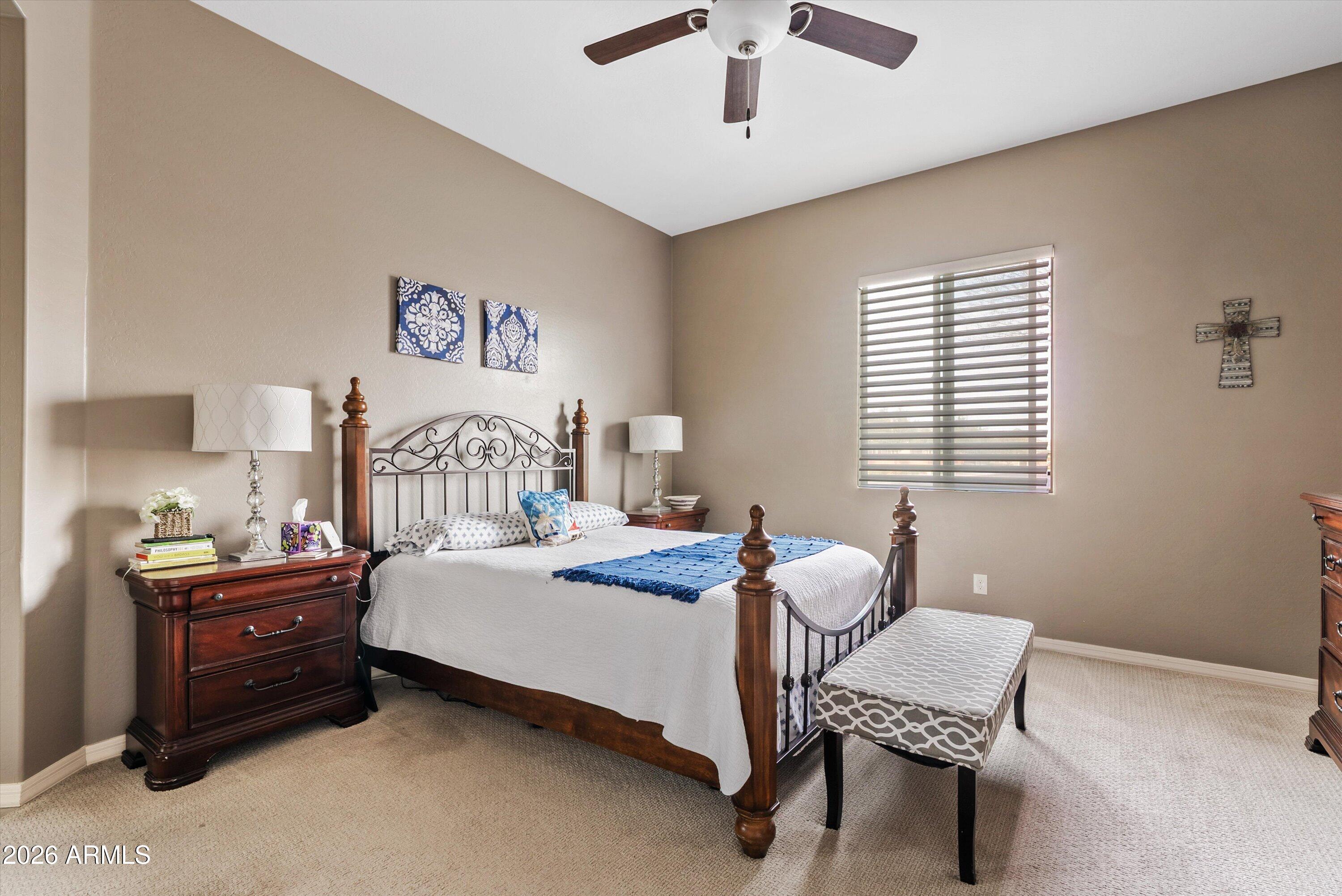 4461 East Jones Street Gilbert, AZ 85295 - Photo 5 of 40 a bedroom with bed and a window