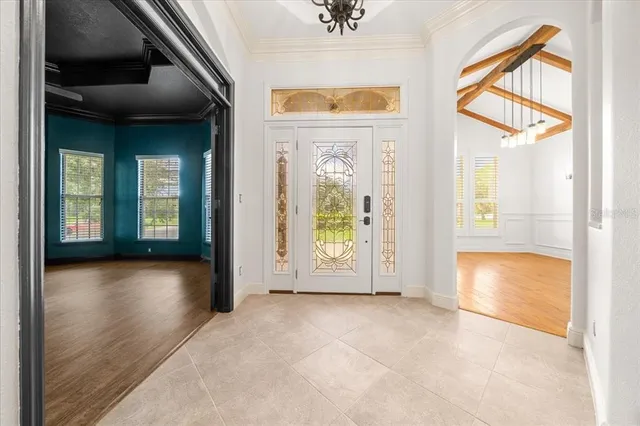 a view of an empty room with a fireplace