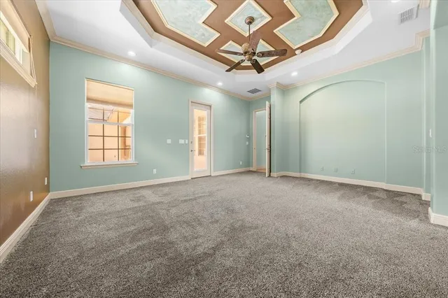 a view of a backyard with roof deck