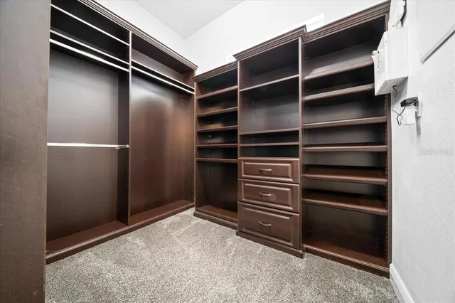 a picture of a bench in a white building